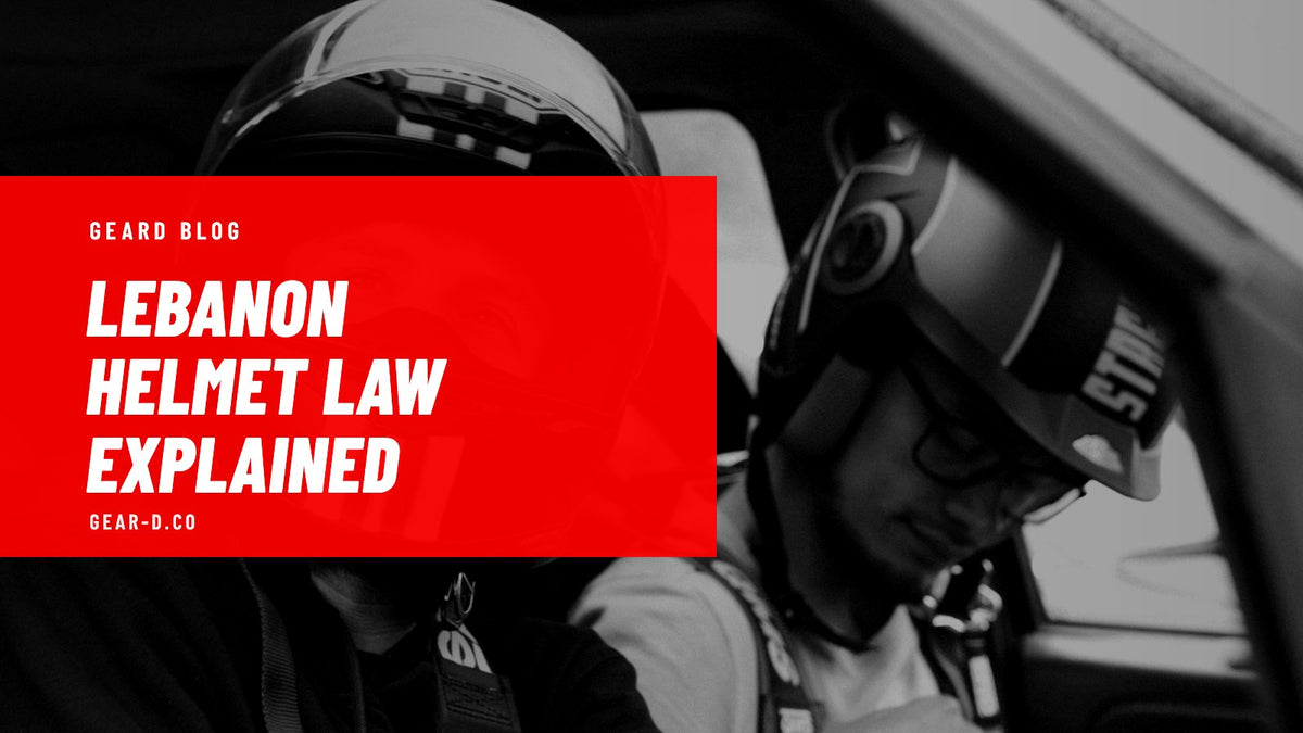 Motorcycle rider and passenger wearing helmets, illustrating the helmet law Lebanon riders must follow